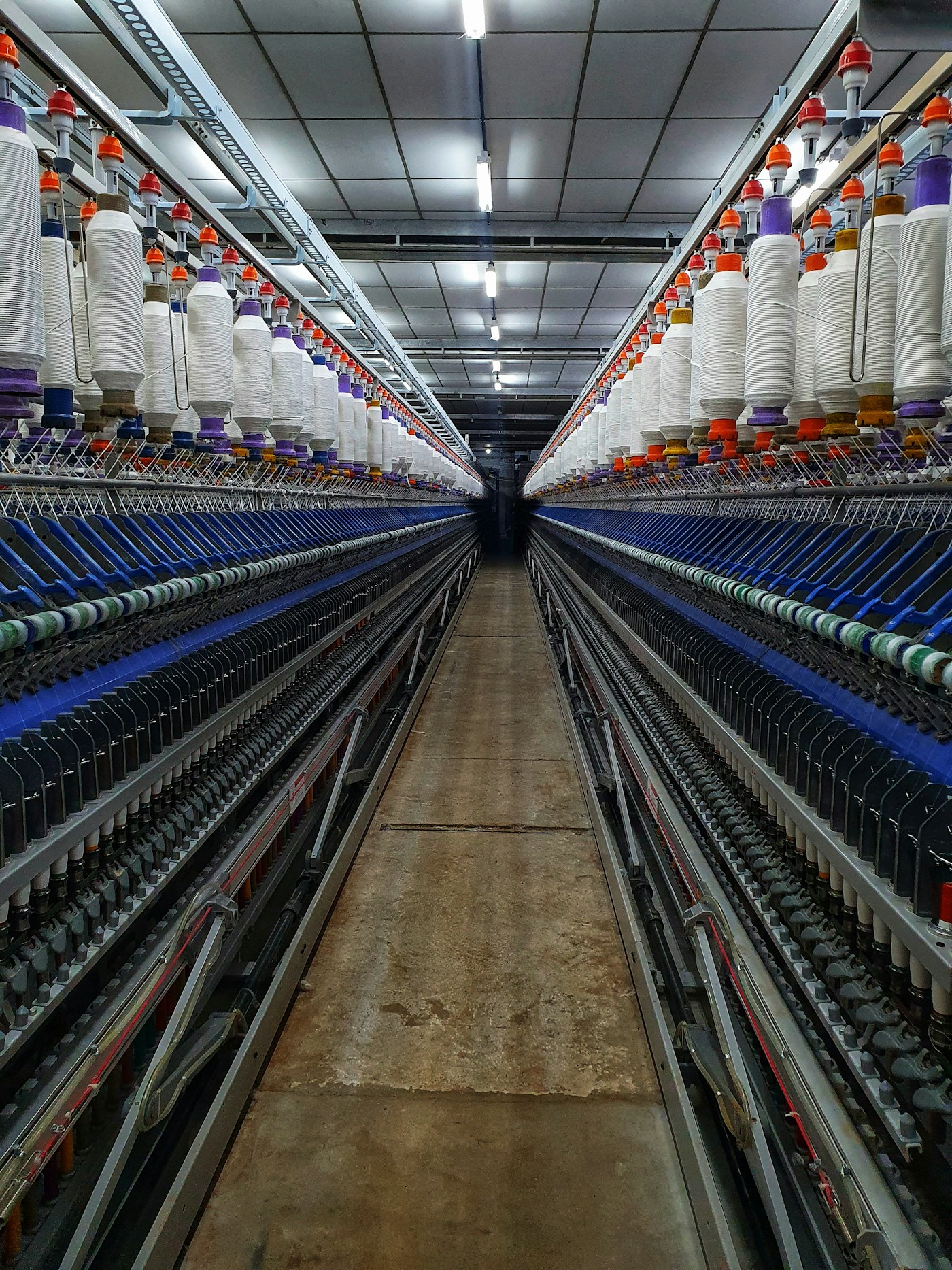 Rows of yarn spinning machines in a textile mill